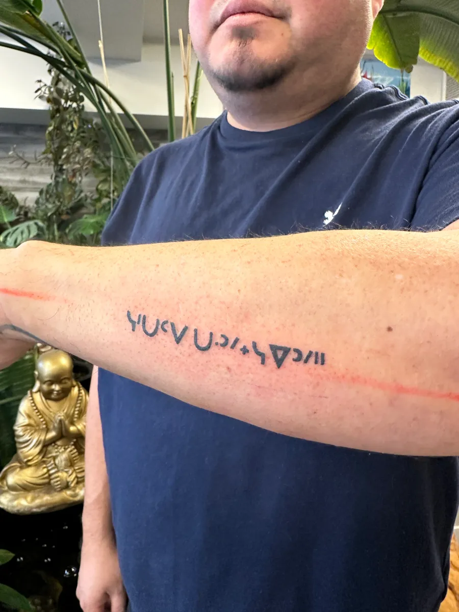 Fine line script tattoo on the inner forearm, Phantom Avenue Edmonton