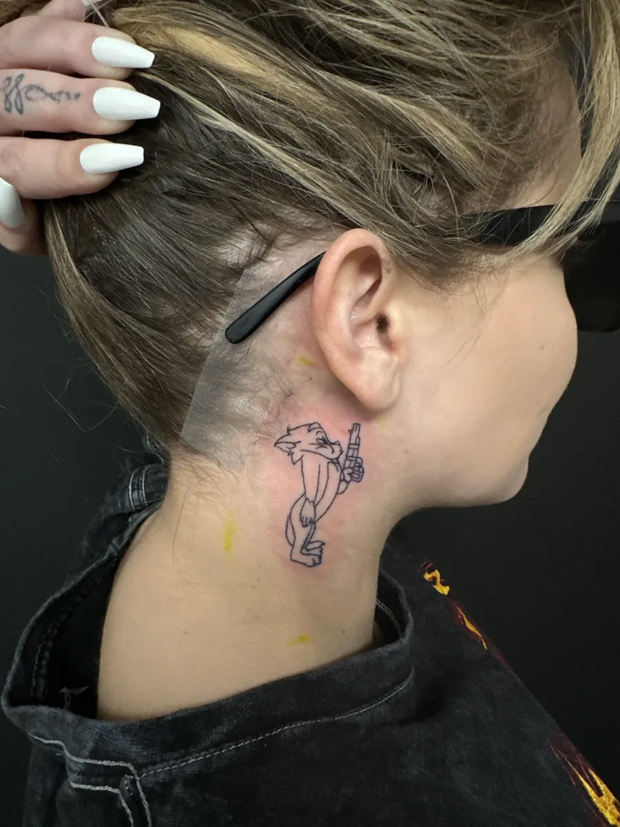 Tiny fine line tattoo below the ear, Phantom Avenue Edmonton