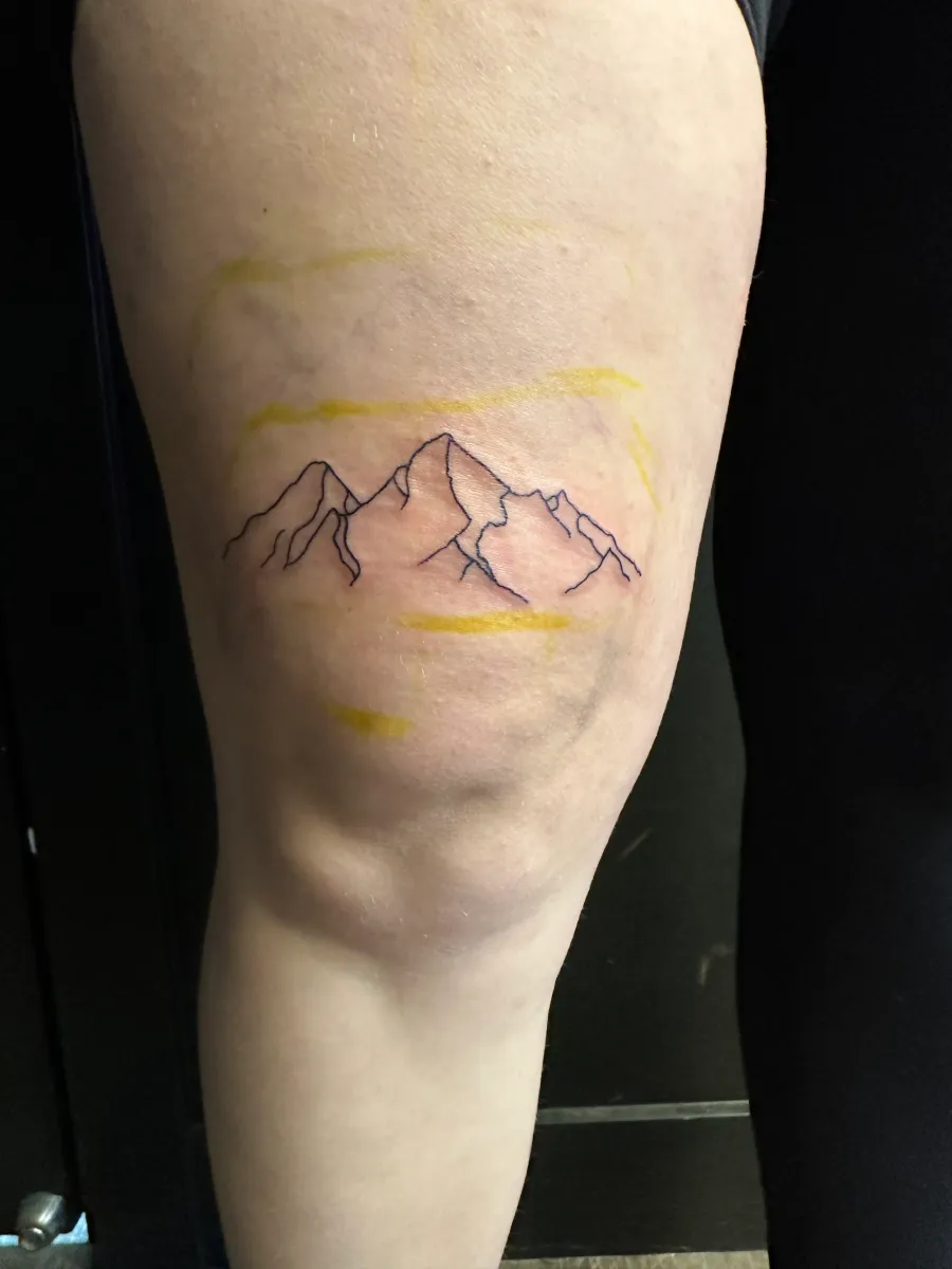 Fine line mountain range tattoo on the inner forearm, Phantom Avenue Edmonton