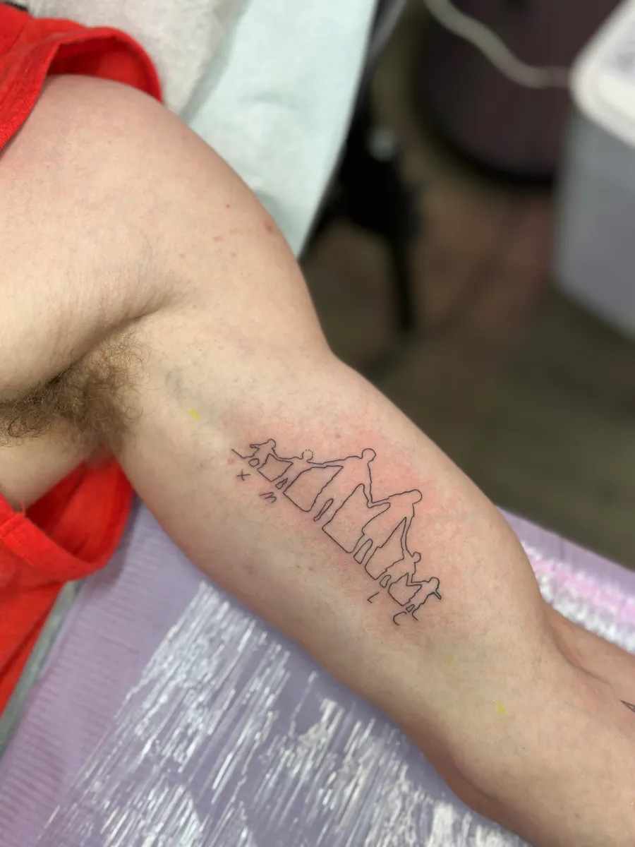 Fine line floral tattoo on the forearm, Phantom Avenue Edmonton