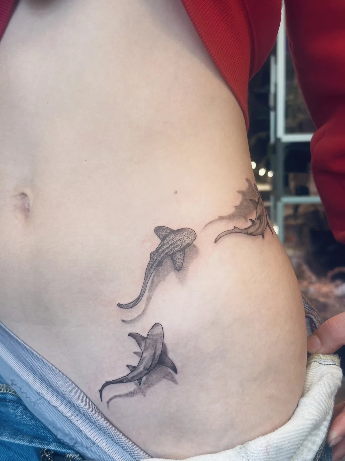 Small black and grey fairy tattoo on the hip, Phantom Avenue Edmonton