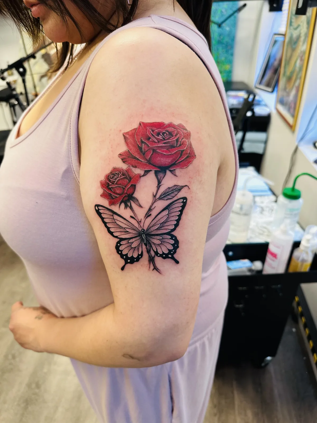 Colour red rose and butterfly tattoo on the shoulder, Phantom Avenue Edmonton