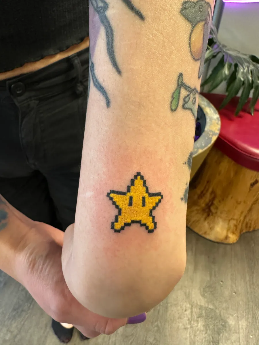 Saturated small-scale colour tattoo from the Phantom Avenue Edmonton portfolio