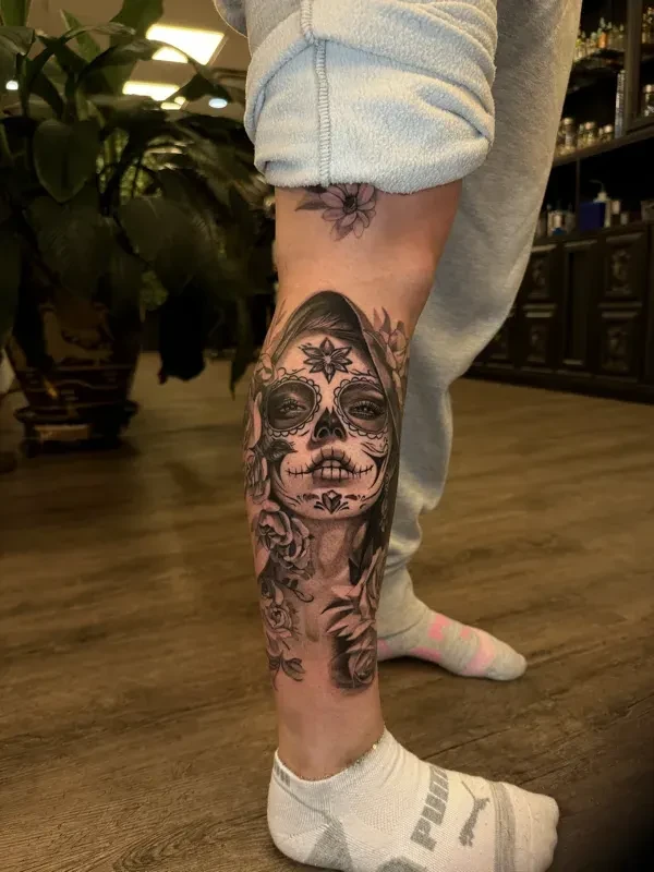 Soft-shaded black and grey tattoo by Juan Del Pino at Phantom Avenue, Edmonton