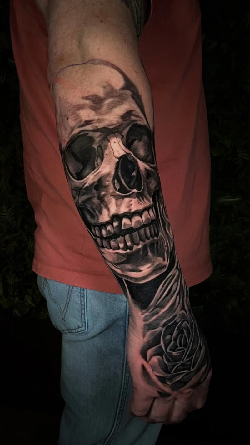 Sweeping large-scale black and grey tattoo by Juan Del Pino at Phantom Avenue, Edmonton
